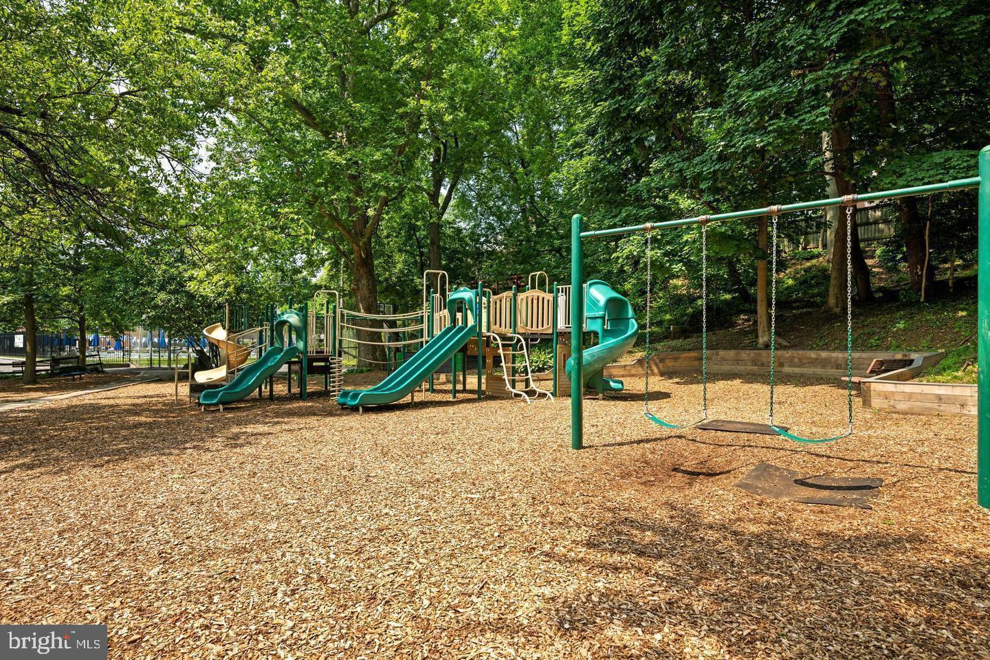 608 Worcester Road Baltimore, MD 21286 - Photo 48 of 49 a view of a park with swings