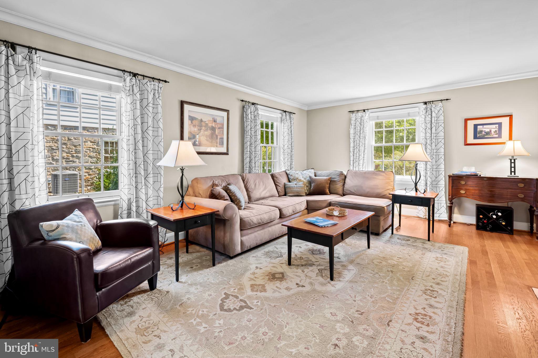 608 Worcester Road Baltimore, MD 21286 - Photo 8 of 49 a living room with furniture a table and a window