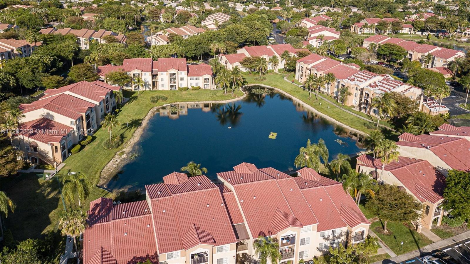 2071 Renaissance Boulevard, Unit 203 Miramar, FL 33025 - Photo 16 of 17 an aerial view of a house with yard swimming pool and outdoor seating