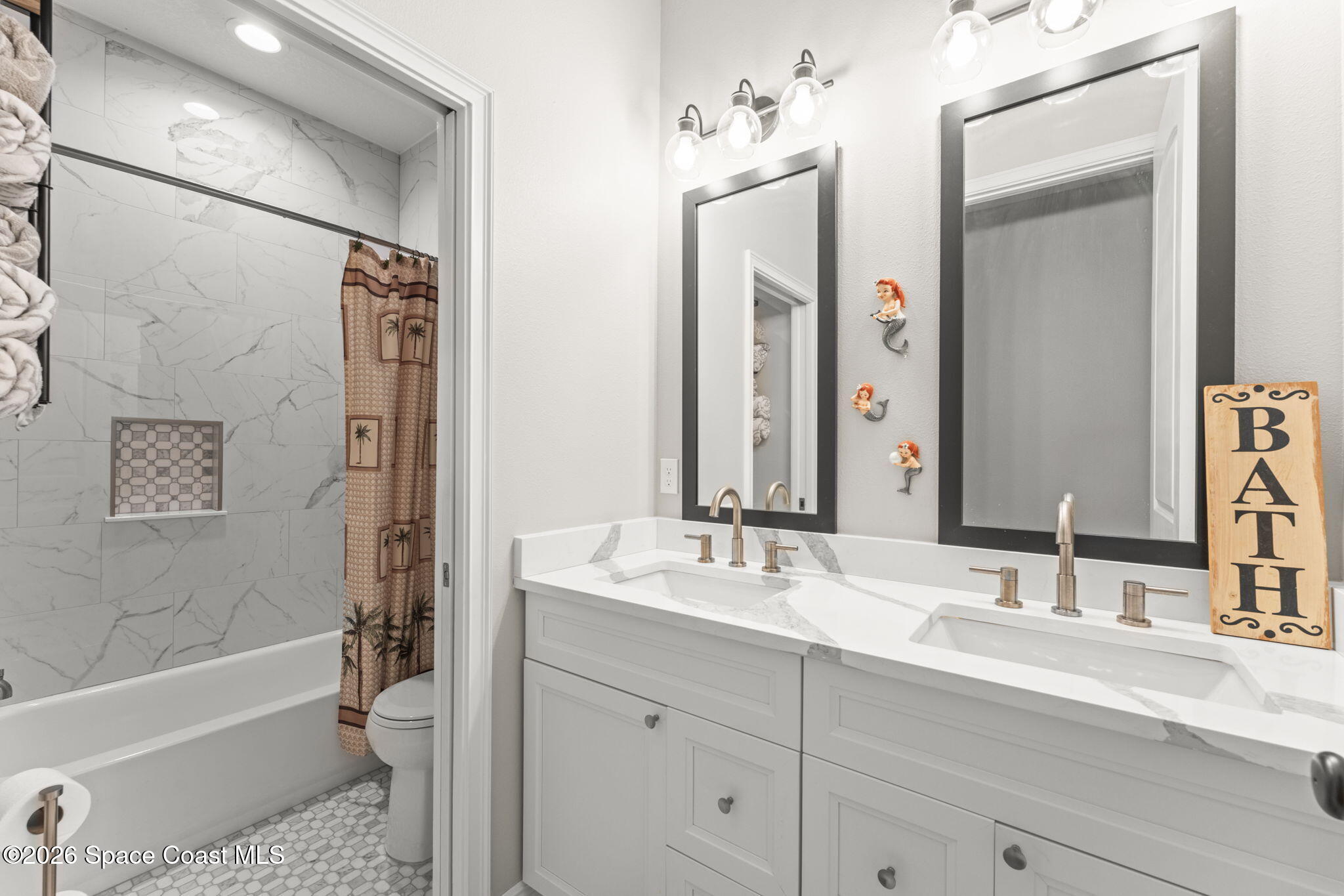 1740 Ford Road Mims, FL 32754 - Photo 31 of 43 a bathroom with a tub a sink and mirror