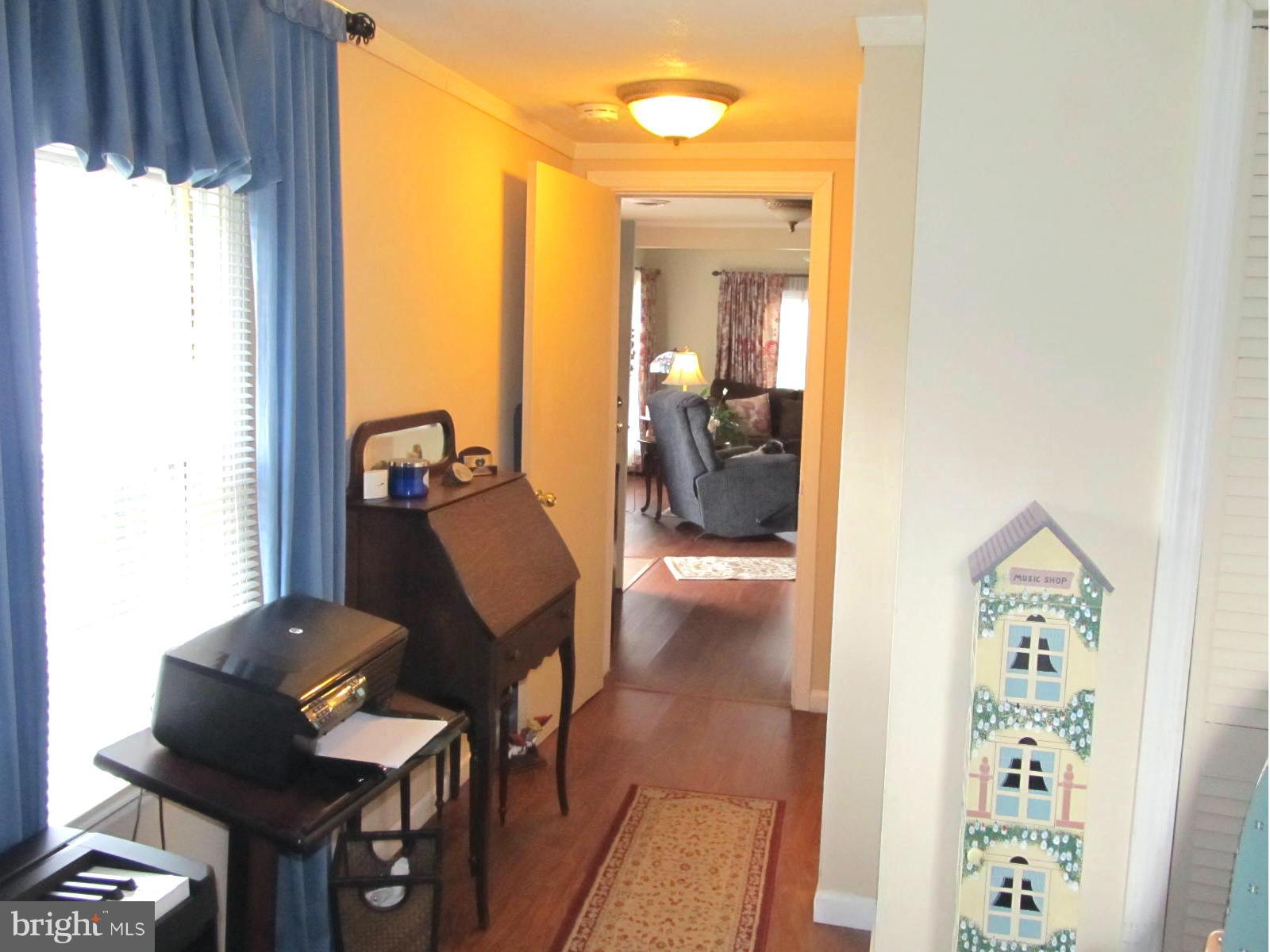 229 Baltimore Street Aberdeen, MD 21001 - Photo 13 of 24 a living room with furniture and a window