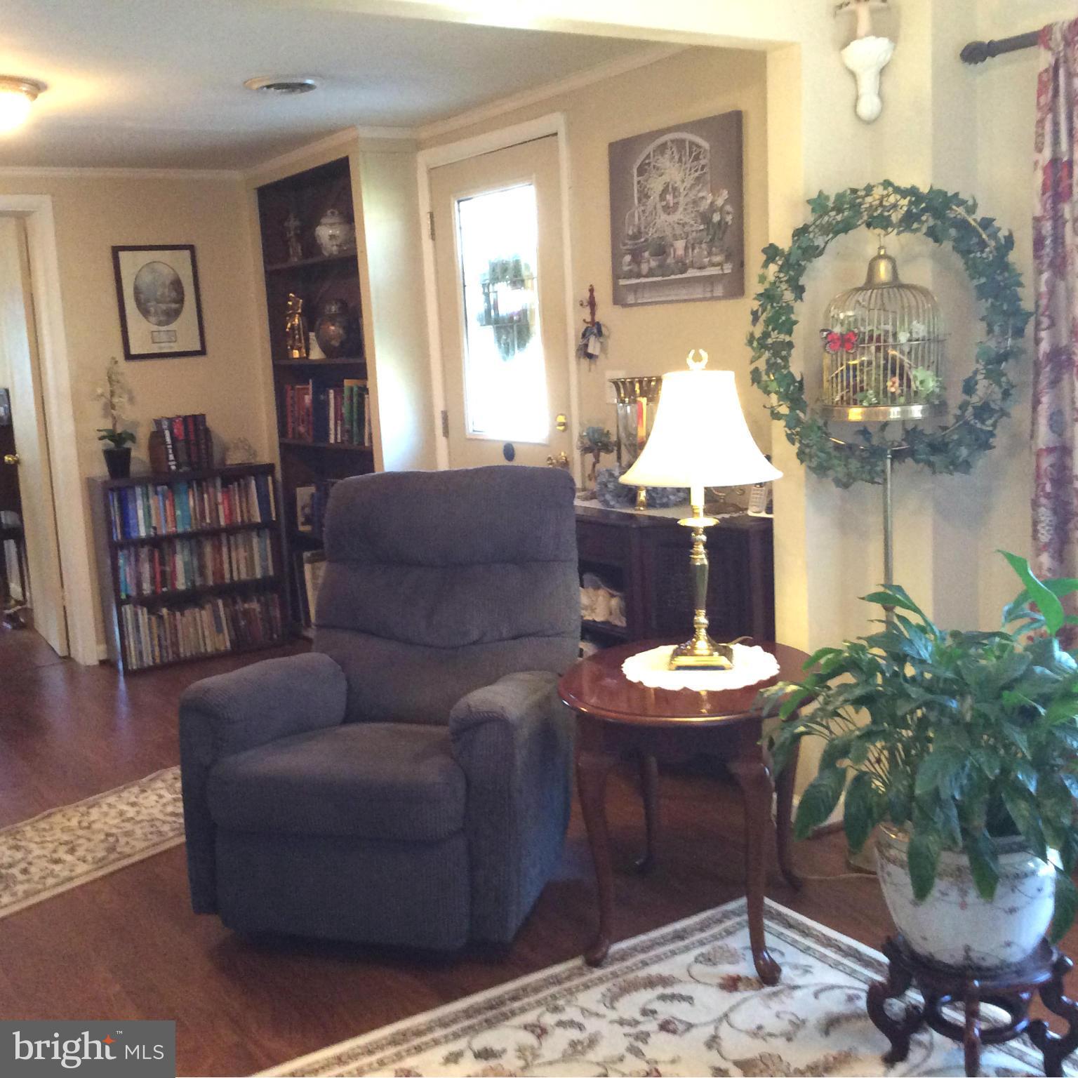 229 Baltimore Street Aberdeen, MD 21001 - Photo 16 of 24 a living room with furniture and a table