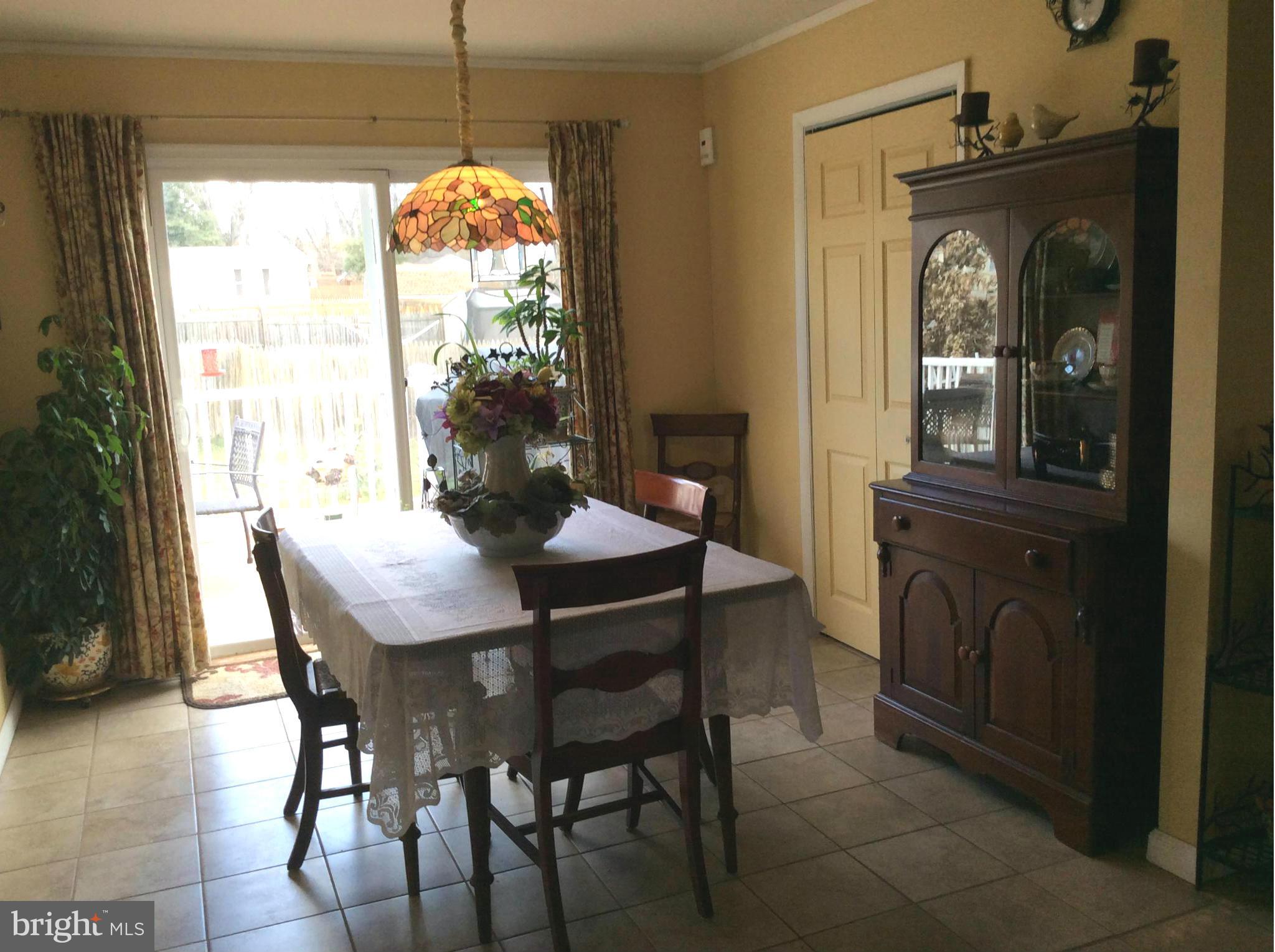 229 Baltimore Street Aberdeen, MD 21001 - Photo 17 of 24 a dining room with furniture and window