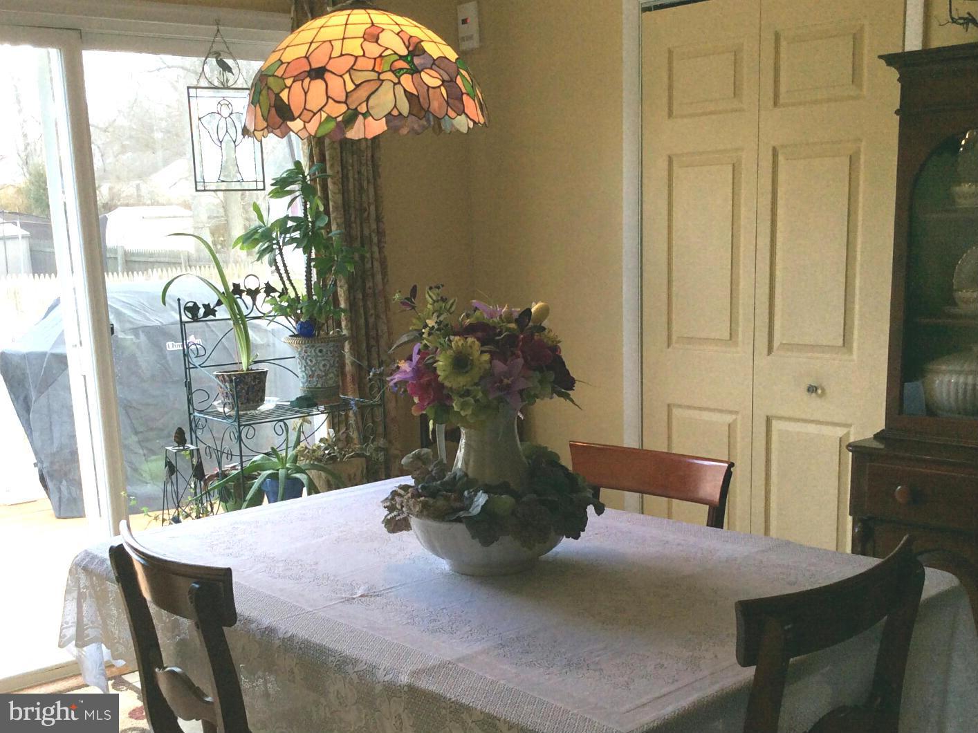 229 Baltimore Street Aberdeen, MD 21001 - Photo 6 of 24 a view of a dining room with furniture window and outside view