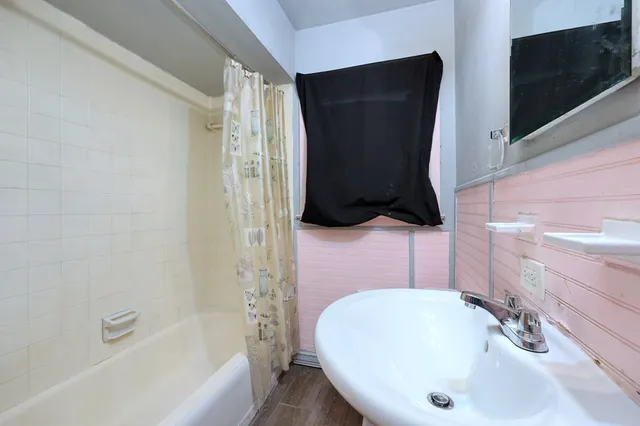 a bathroom with a sink and a tub