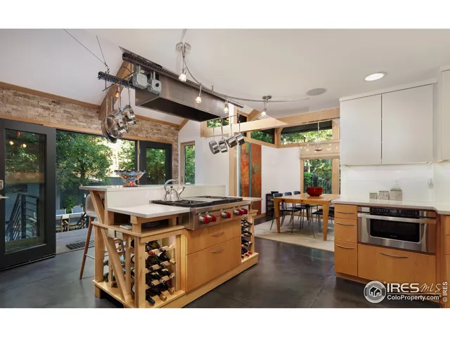 a view of a workspace with furniture