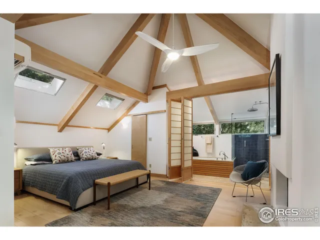a bathroom with a sink and a large mirror