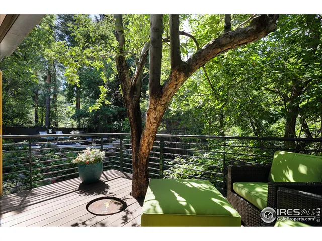 a view of swimming pool from a balcony