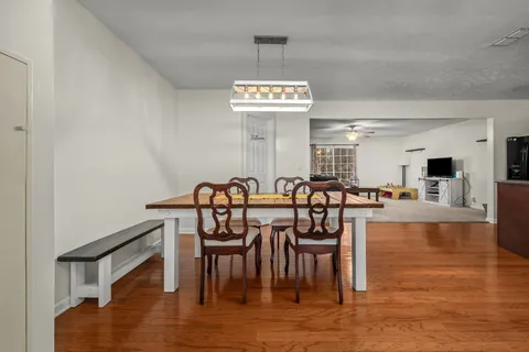 a view of a dining room with furniture