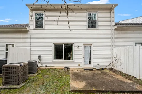 a bathroom with a granite countertop sink and vanity
