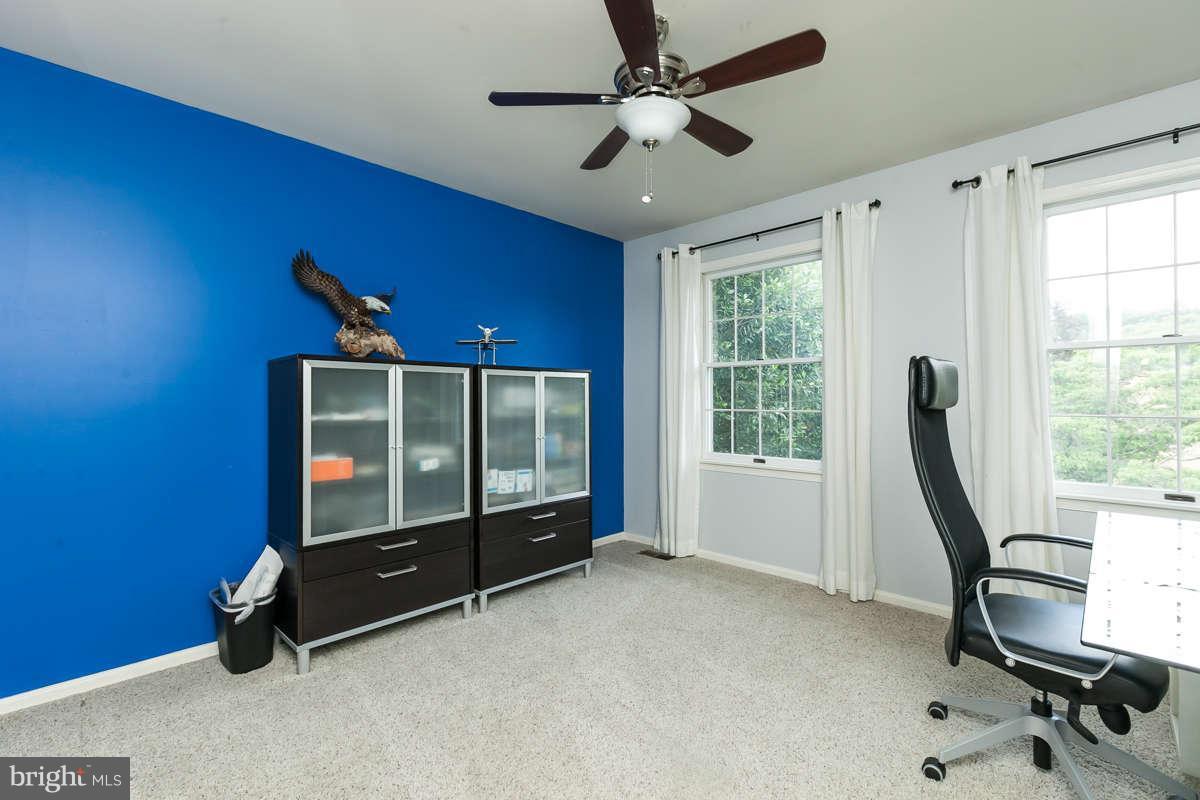 1769 Florence Road Mount Airy, MD 21771 - Photo 23 of 30 a room with gym equipment and a large window