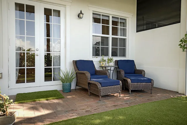 a house view with sitting space and garden