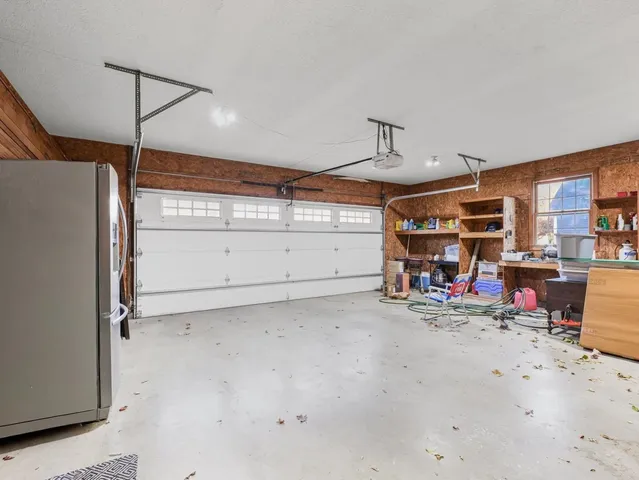 a view of a workspace with furniture