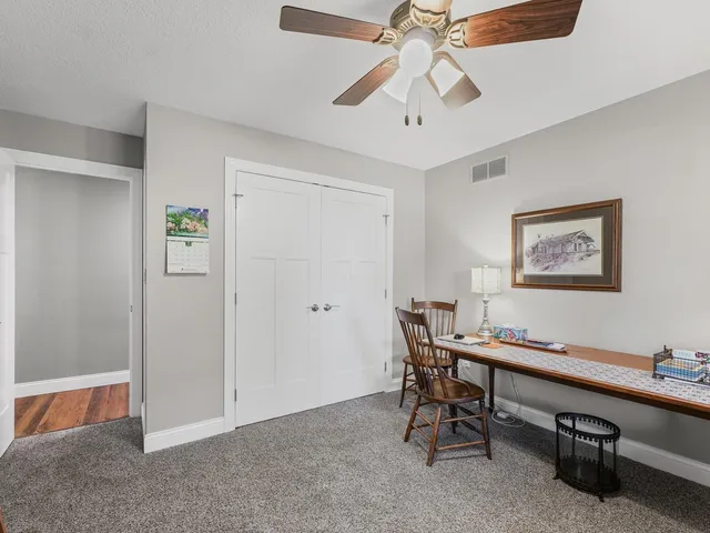a bathroom with a toilet and a bathtub