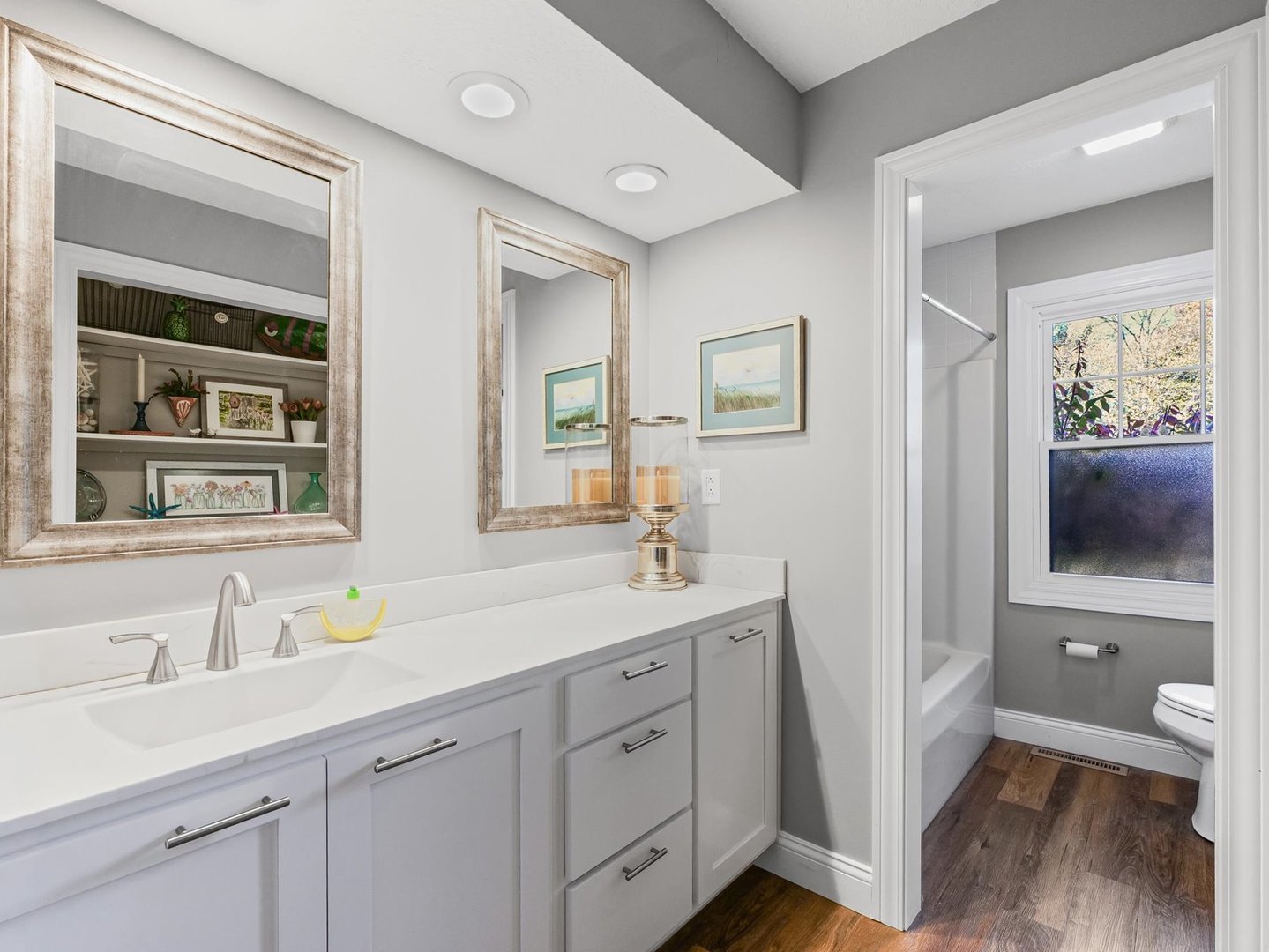13 Prairie Acres Monticello, IL 61856 - Photo 30 of 53 a spacious bathroom with a toilet a sink a mirror and a shower