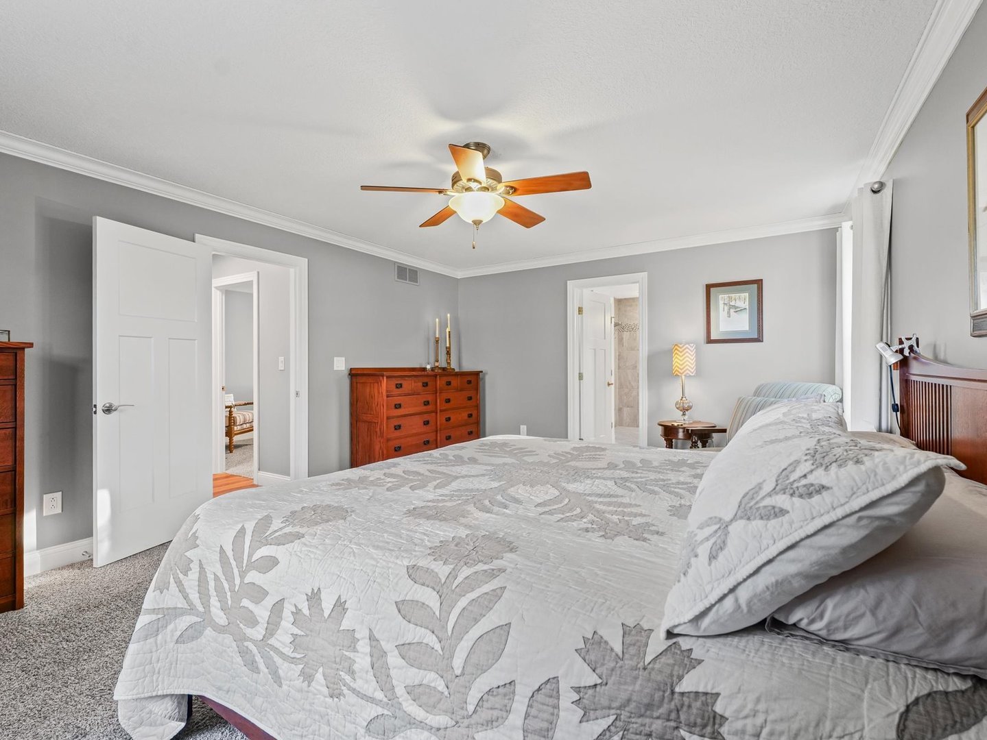 13 Prairie Acres Monticello, IL 61856 - Photo 33 of 53 a bedroom with a bed and a chandelier