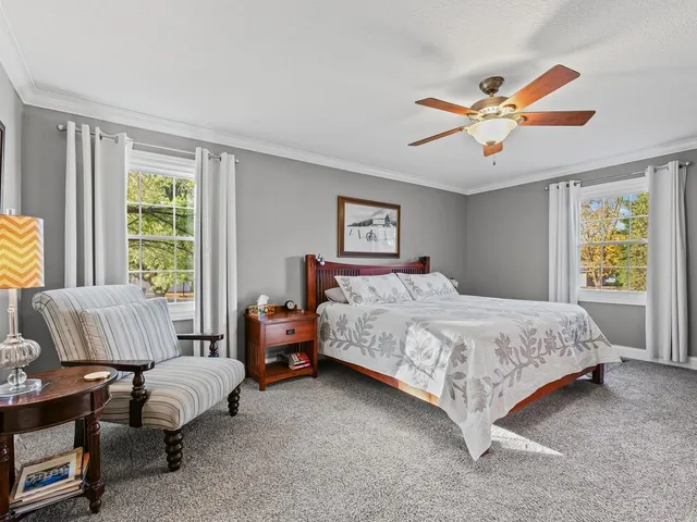 a view of a storage and utility room with washer and dryer