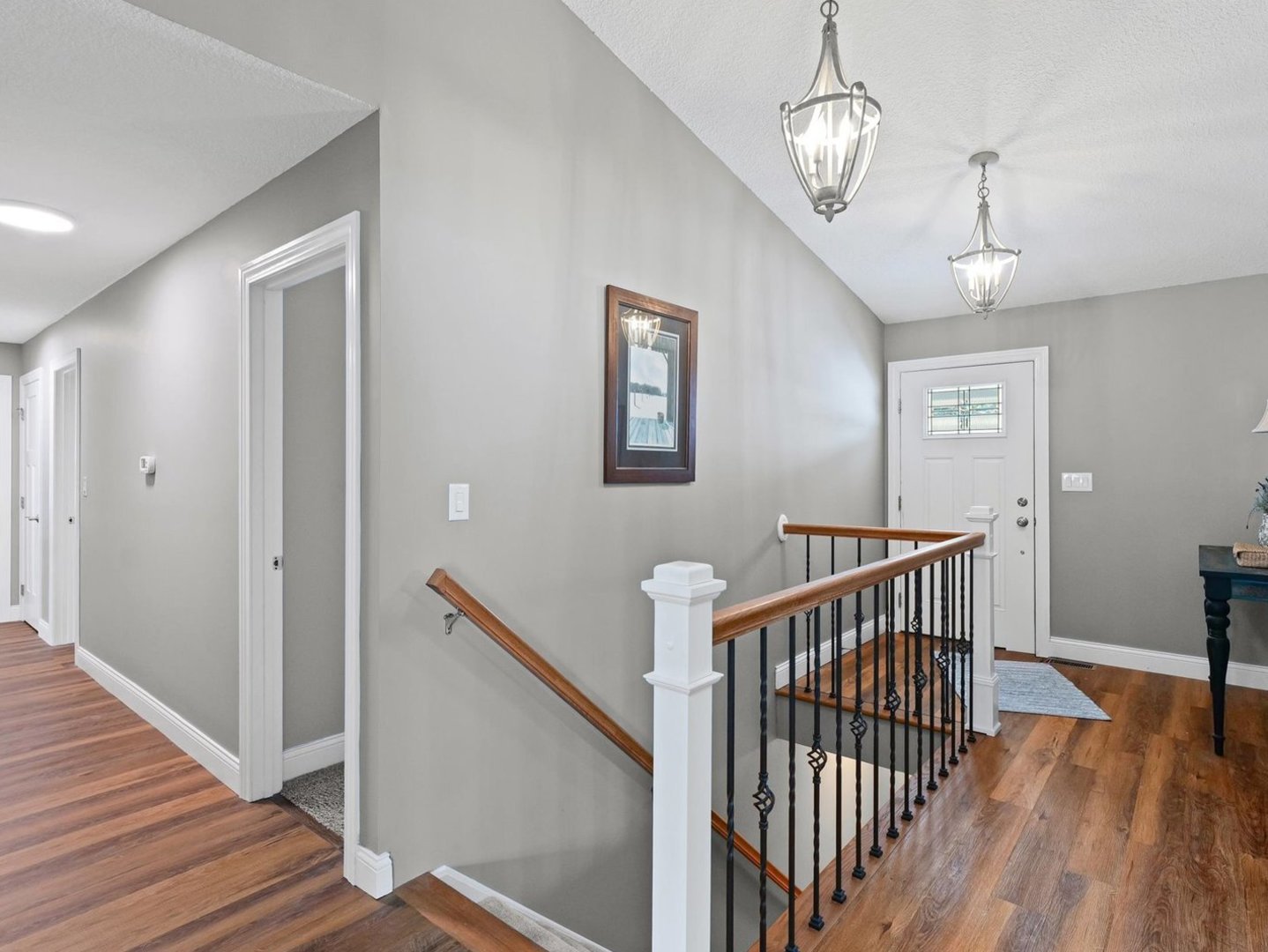 13 Prairie Acres Monticello, IL 61856 - Photo 7 of 53 a view of hallway with wooden floor and chandelier