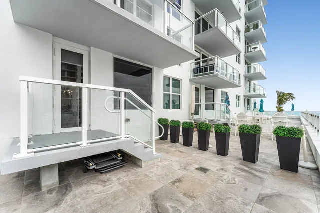a view of a patio with a sitting area