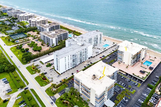 a view of building with yard