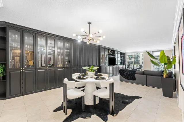 a bathroom with a toilet a sink and a mirror