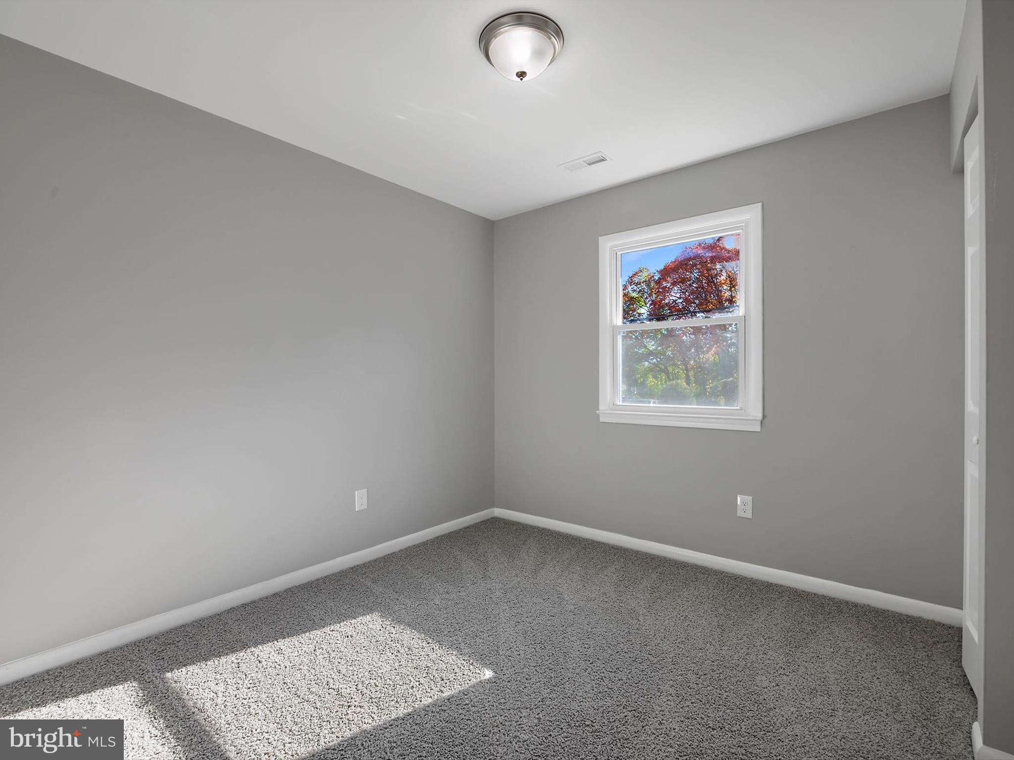 8635 Emory Grove Road Gaithersburg, MD 20877 - Photo 15 of 38 an empty room with a window
