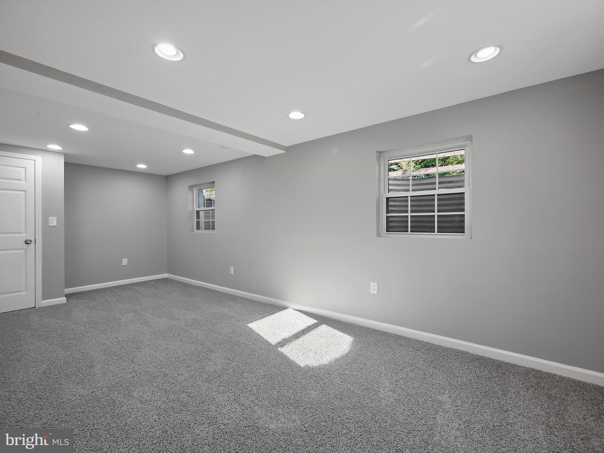 8635 Emory Grove Road Gaithersburg, MD 20877 - Photo 27 of 38 an empty room with windows