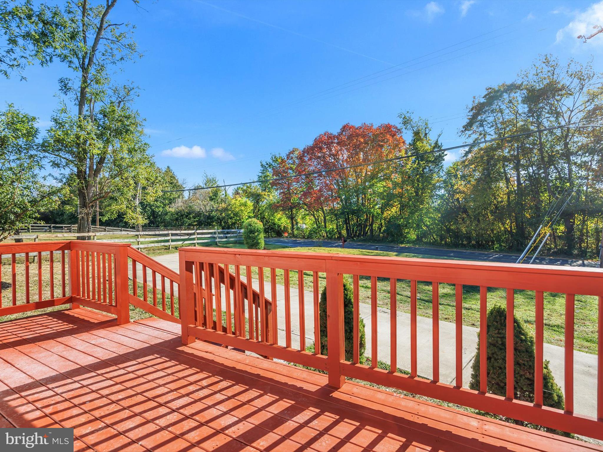 8635 Emory Grove Road Gaithersburg, MD 20877 - Photo 34 of 38 a balcony with wooden floor and fence