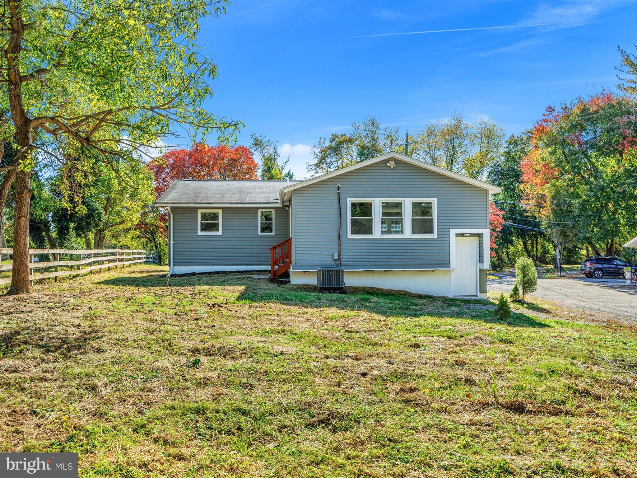 8635 Emory Grove Road Gaithersburg, MD 20877 - Photo 36 of 38 a front view of a house with a garden