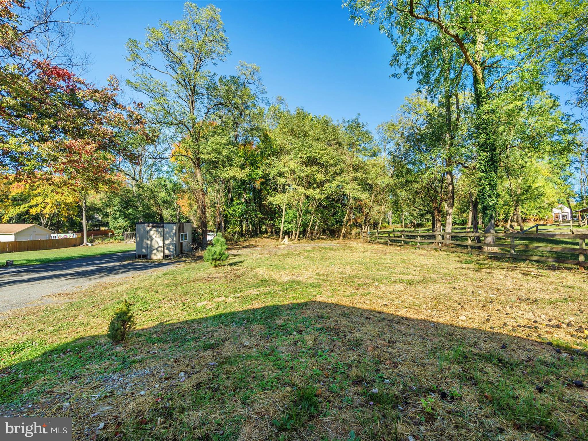 8635 Emory Grove Road Gaithersburg, MD 20877 - Photo 38 of 38 a view of yard with swimming pool and trees