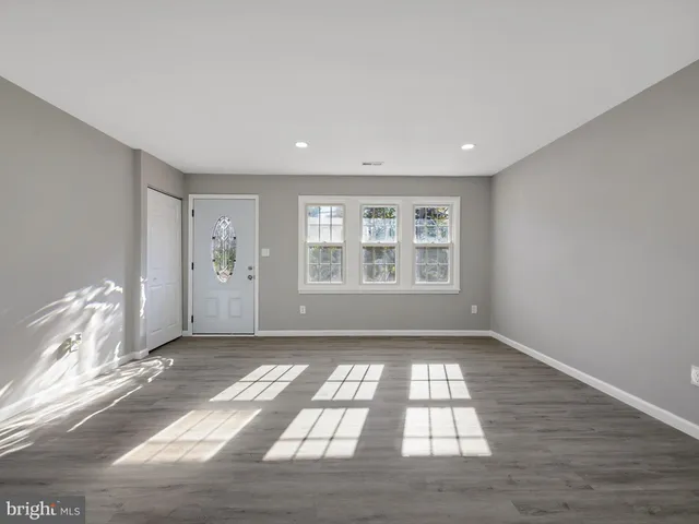 a view of an empty room and window