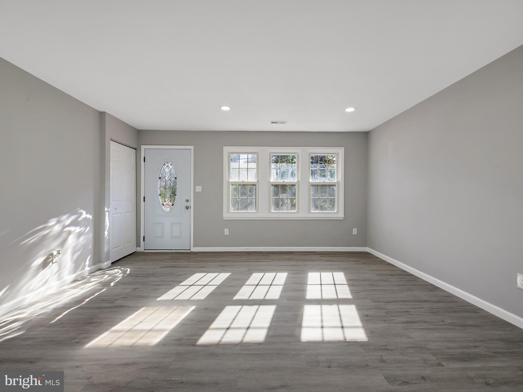 8635 Emory Grove Road Gaithersburg, MD 20877 - Photo 8 of 38 a view of an empty room and window