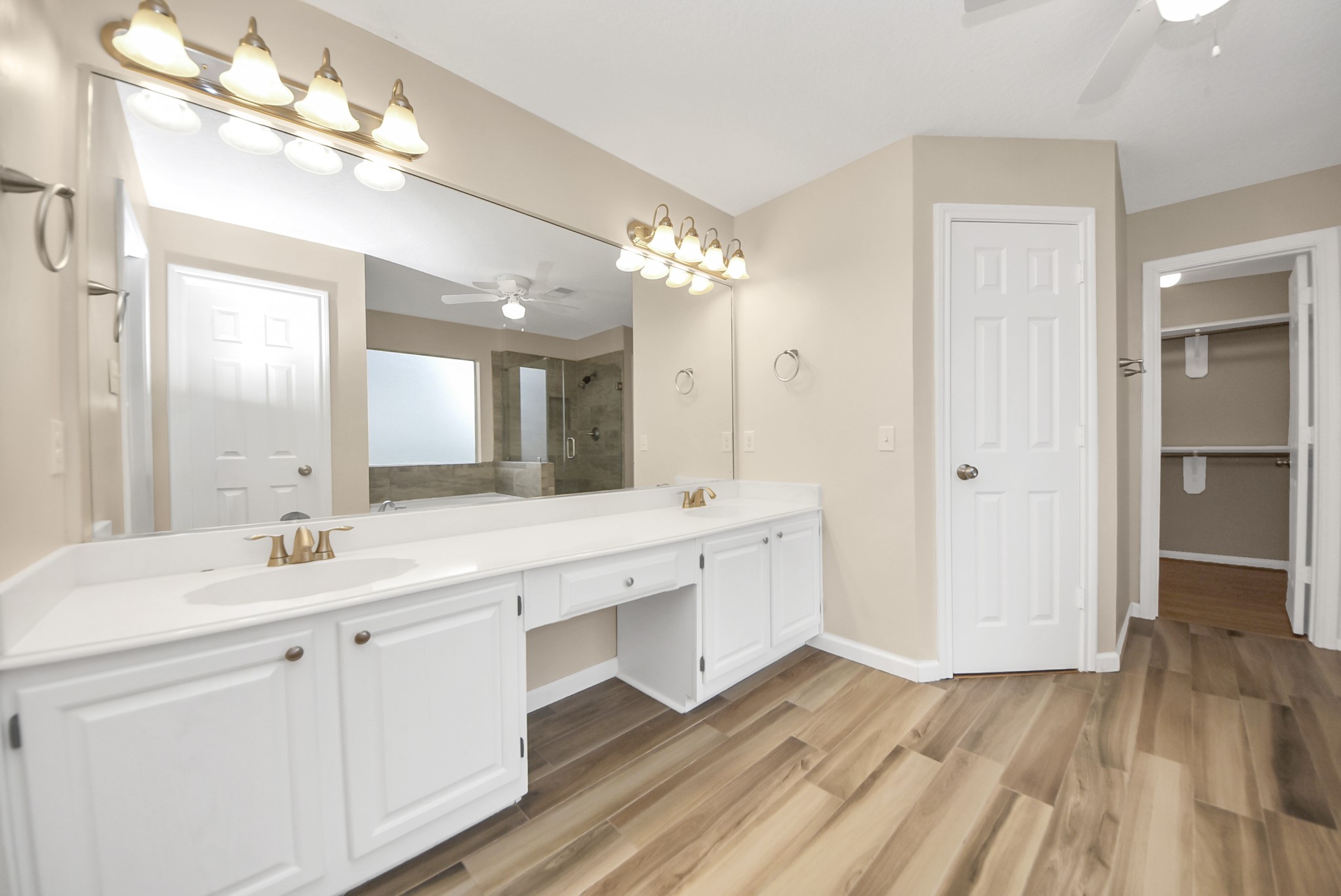 1702 Park Ridge Drive Katy, TX 77450 - Photo 25 of 30 a bathroom with a double vanity sink and a mirror