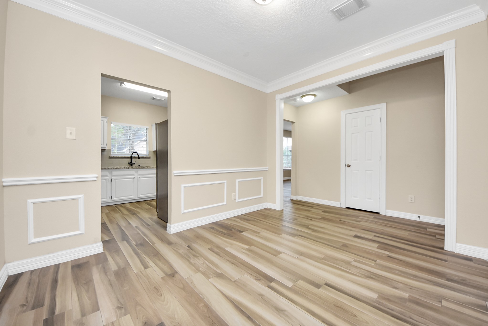 1702 Park Ridge Drive Katy, TX 77450 - Photo 6 of 30 wooden floor in an empty room