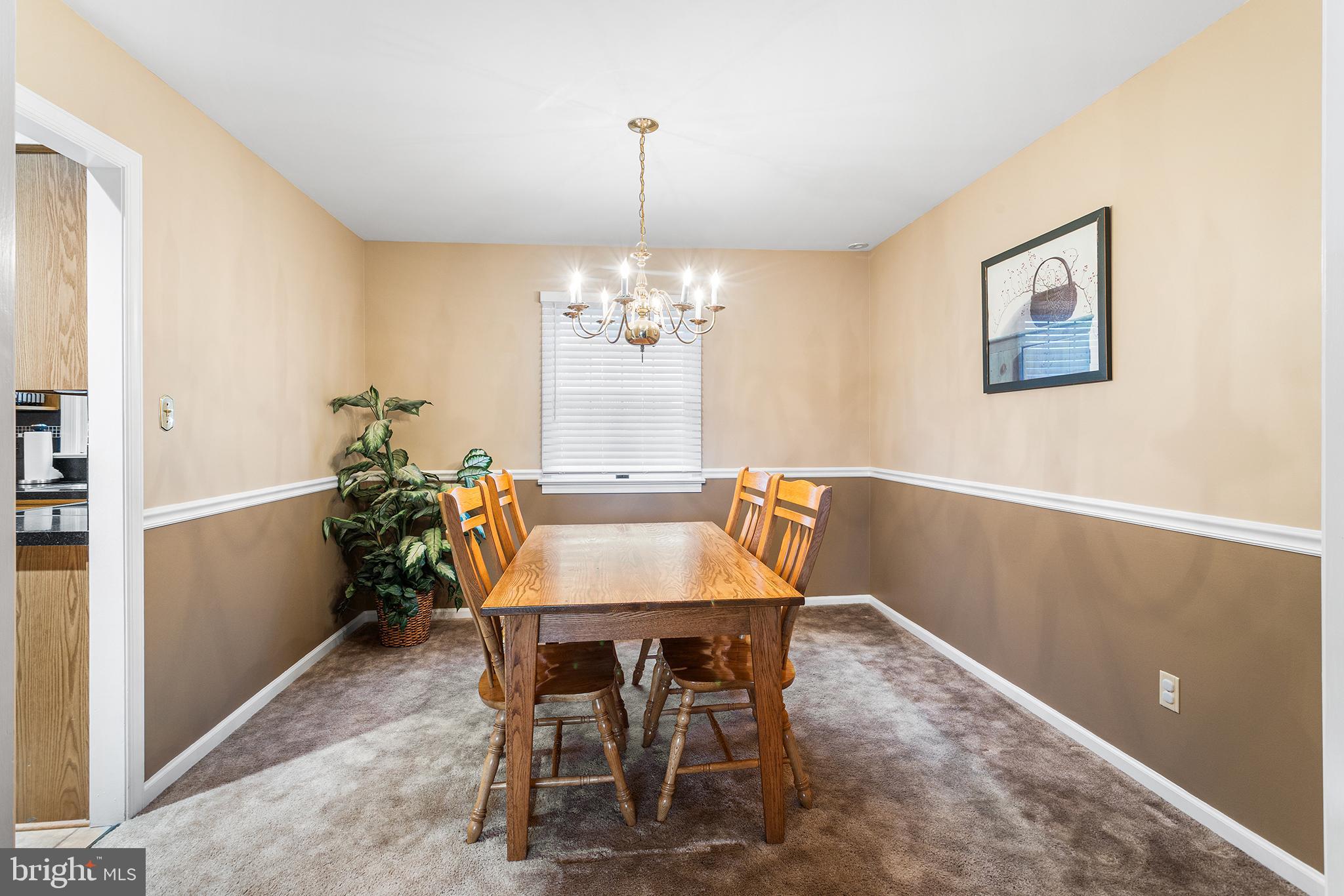 241 Diamond Street Souderton, PA 18964 - Photo 13 of 35 a view of a dining room with furniture and window