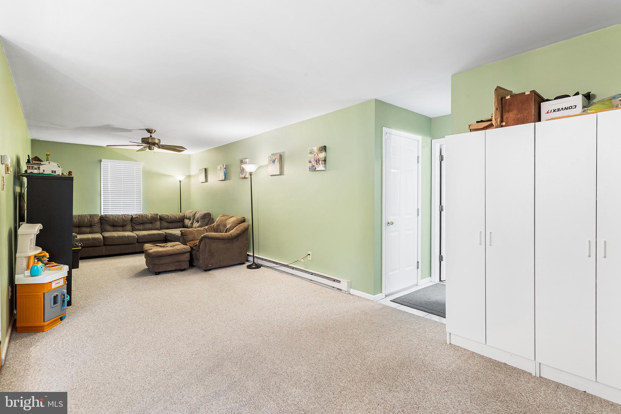 241 Diamond Street Souderton, PA 18964 - Photo 20 of 35 a living room with furniture and a flat screen tv