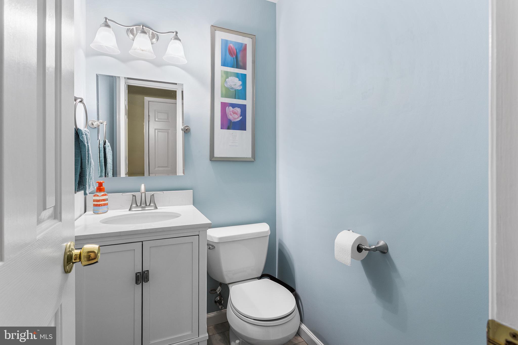 241 Diamond Street Souderton, PA 18964 - Photo 22 of 35 a bathroom with a toilet sink and mirror