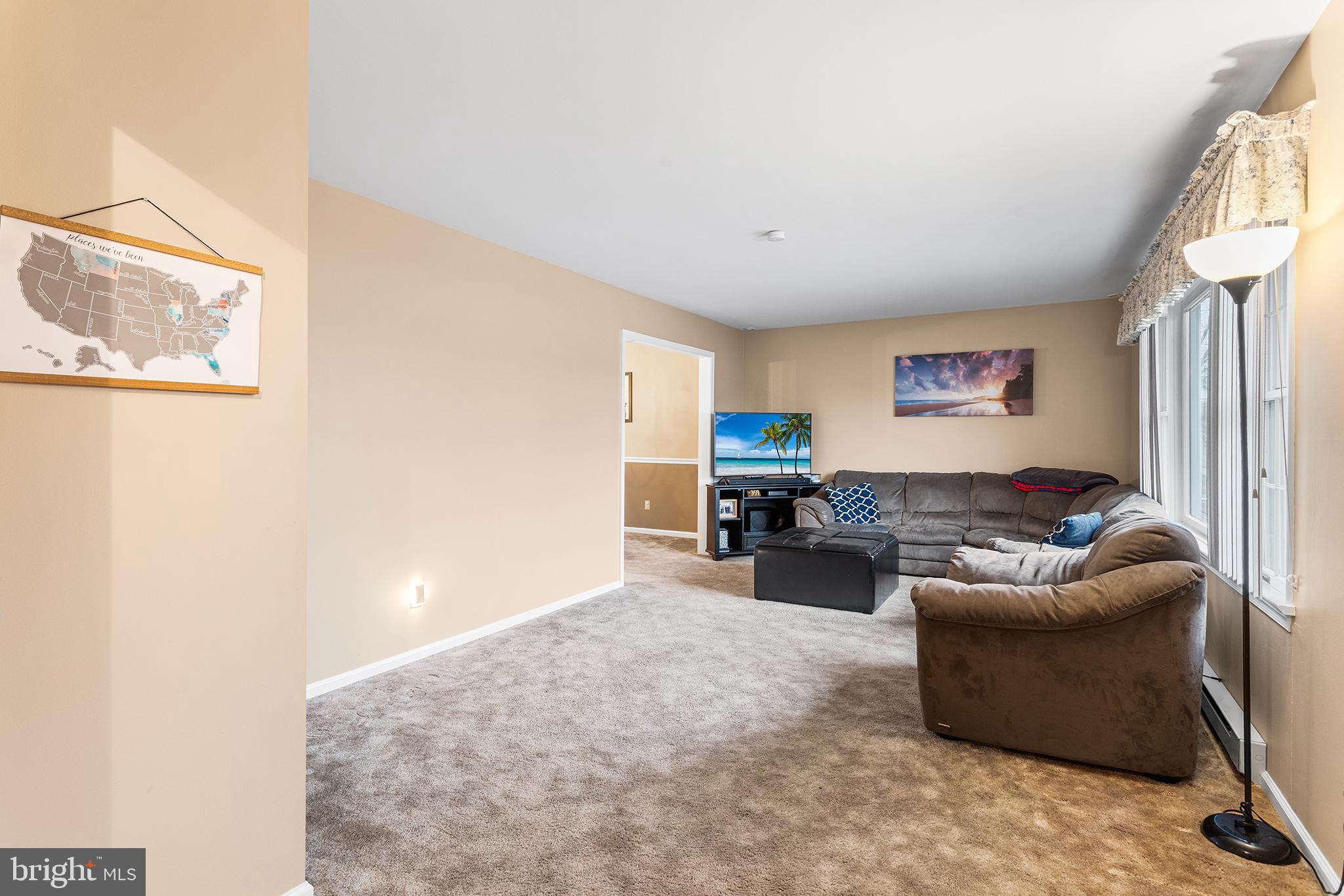 241 Diamond Street Souderton, PA 18964 - Photo 24 of 35 a living room with furniture and a flat screen tv