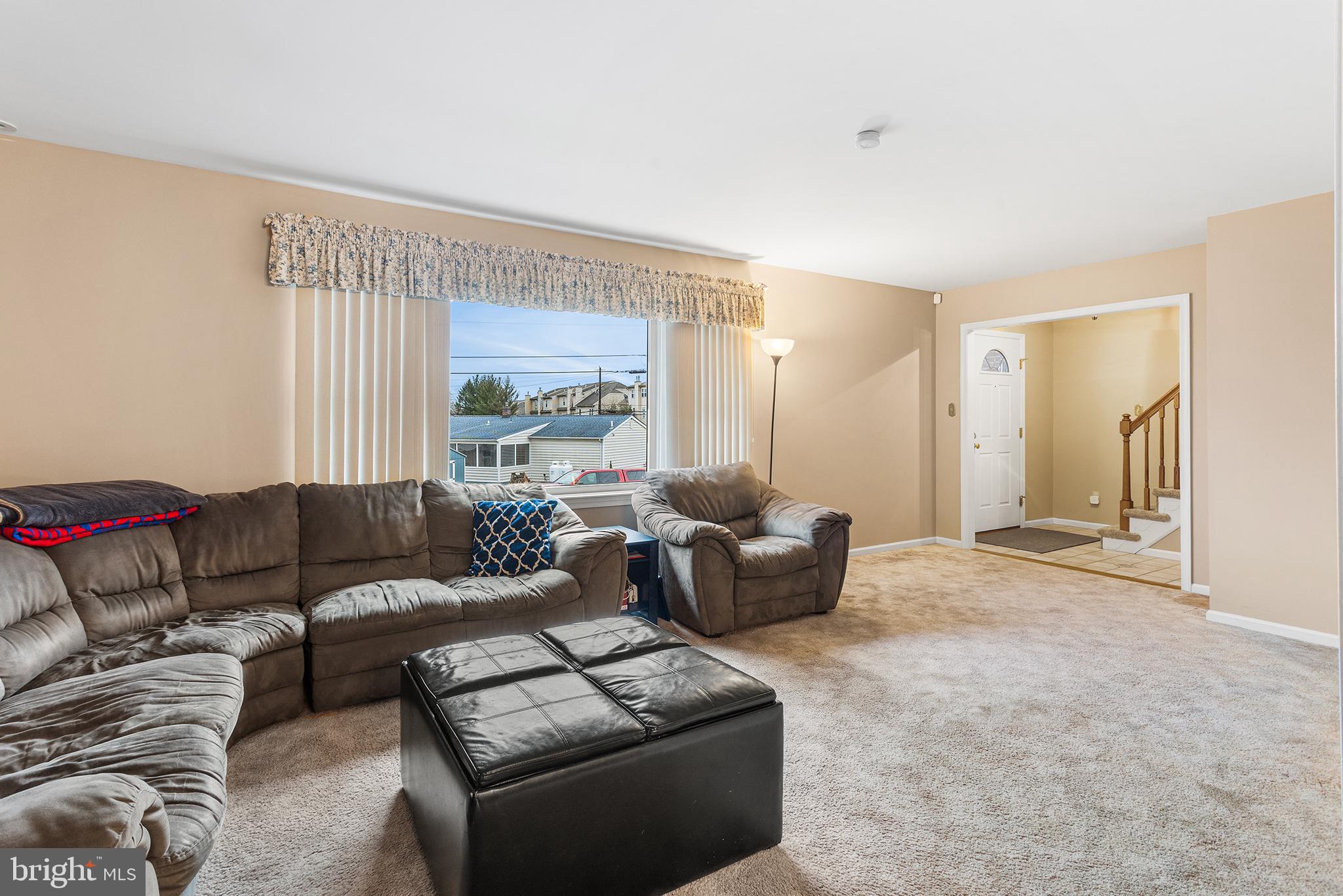 241 Diamond Street Souderton, PA 18964 - Photo 25 of 35 a living room with furniture and a large window