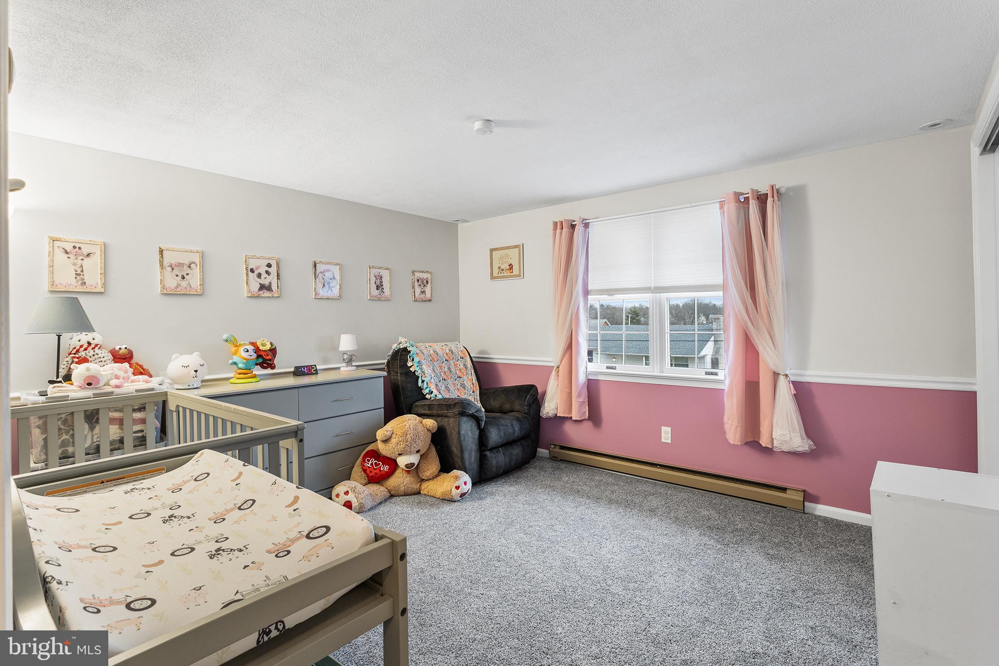 241 Diamond Street Souderton, PA 18964 - Photo 27 of 35 a bed room with a bed and a window