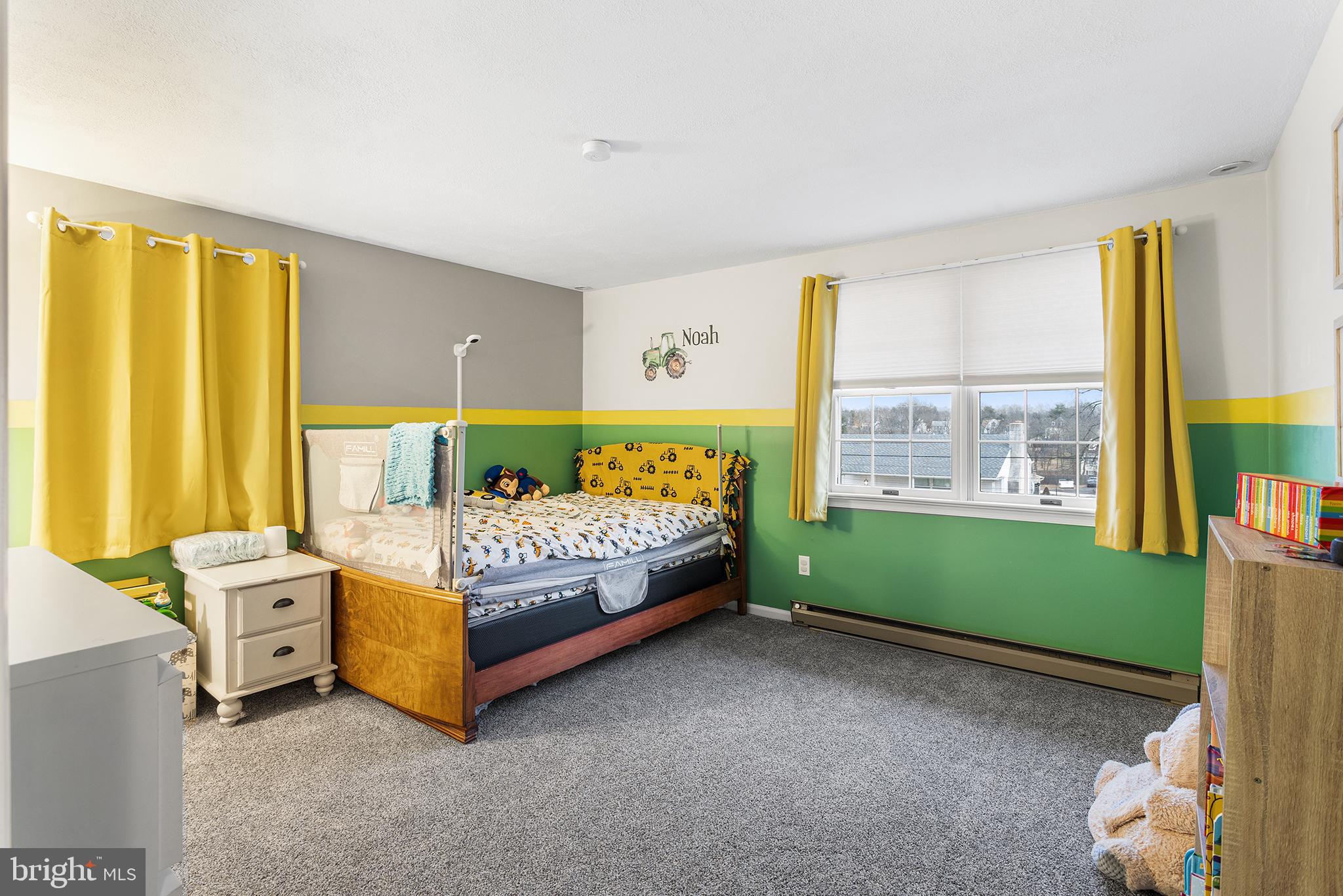 241 Diamond Street Souderton, PA 18964 - Photo 29 of 35 a bed sitting in a bedroom next to a window