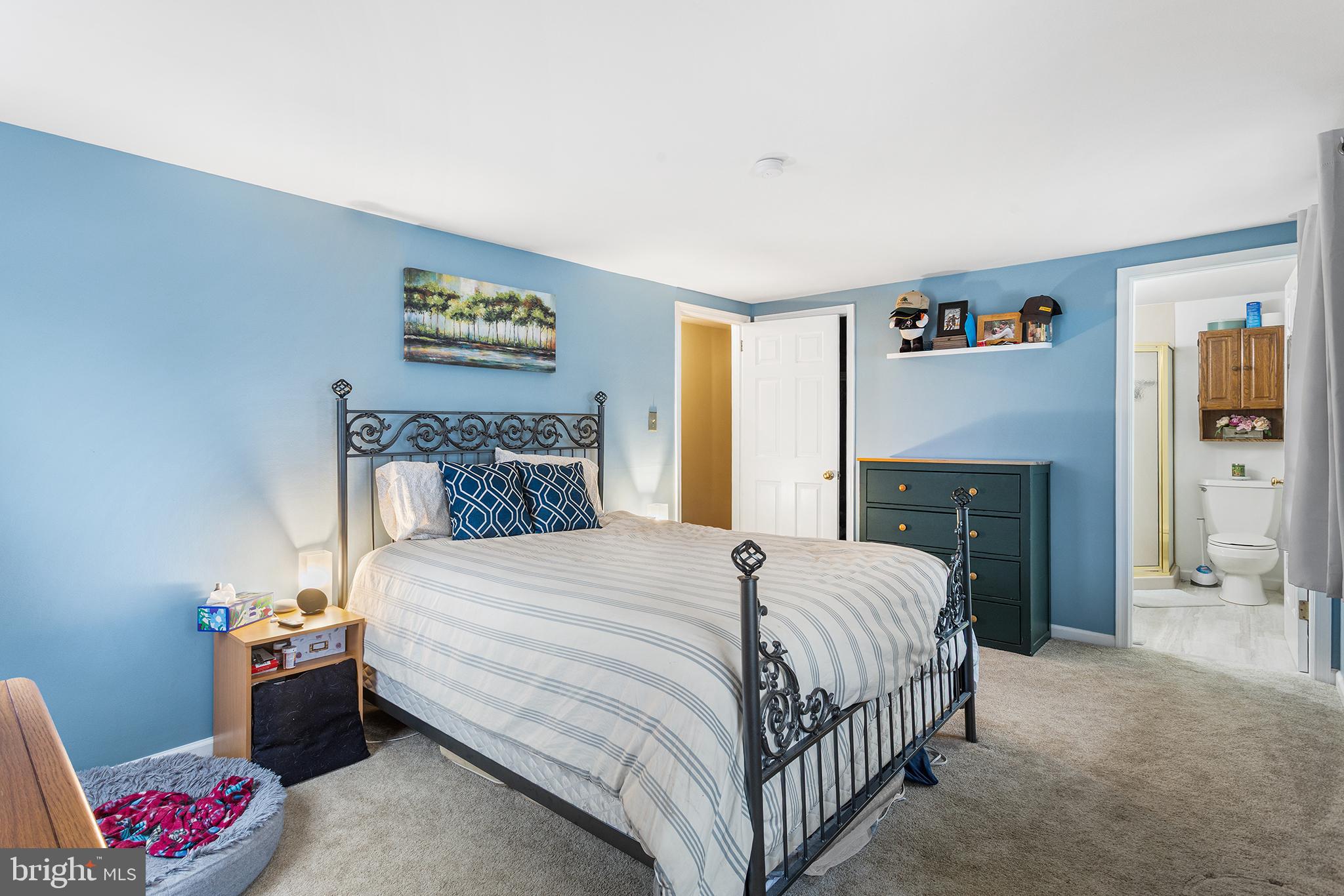 241 Diamond Street Souderton, PA 18964 - Photo 32 of 35 a bedroom with a bed and a couch