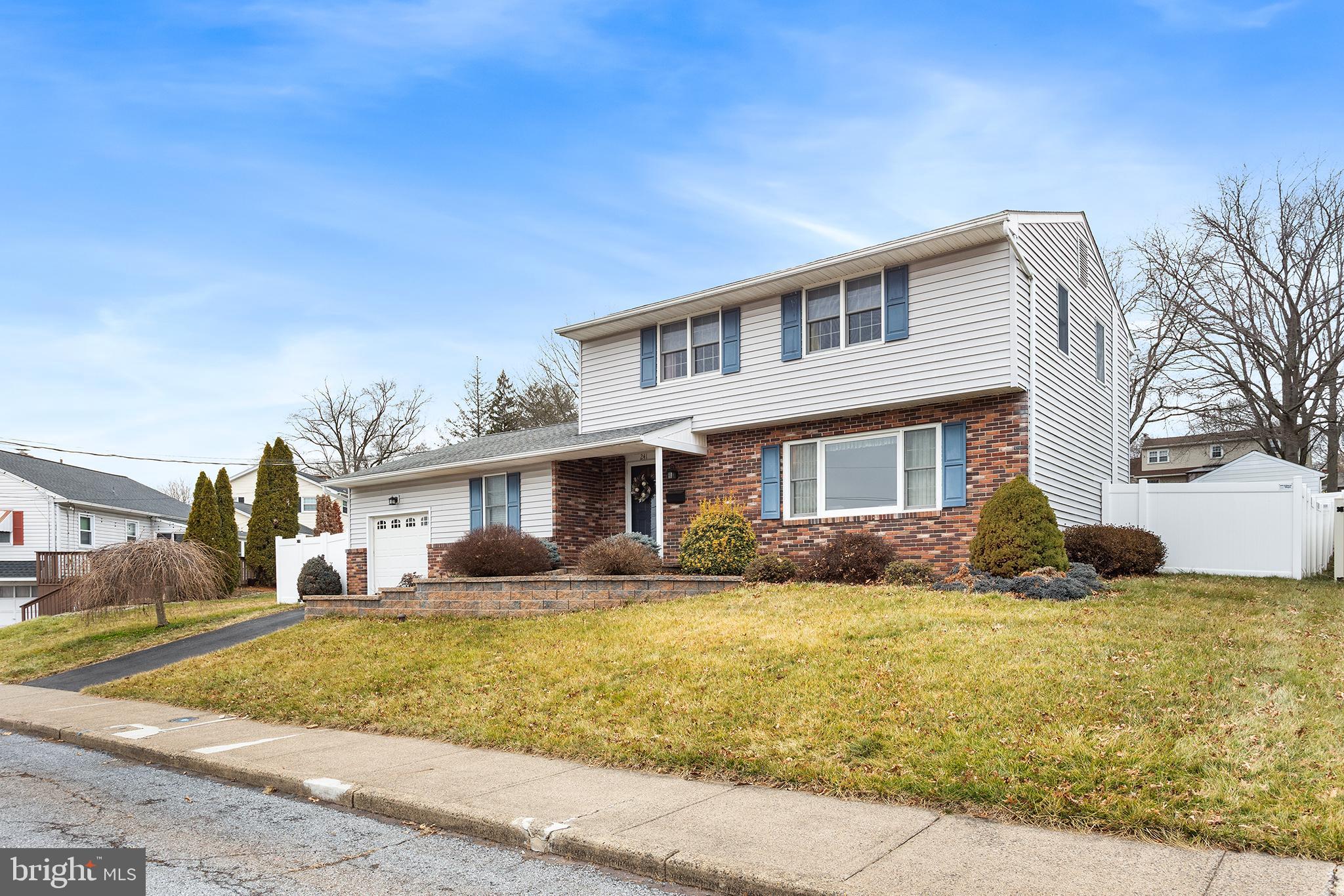 241 Diamond Street Souderton, PA 18964 - Photo 8 of 35 a front view of a house with swimming pool and porch