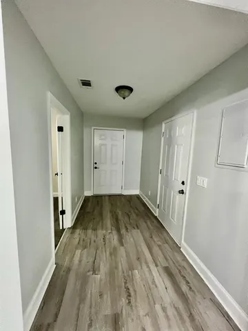 a view of a house with pool and yard