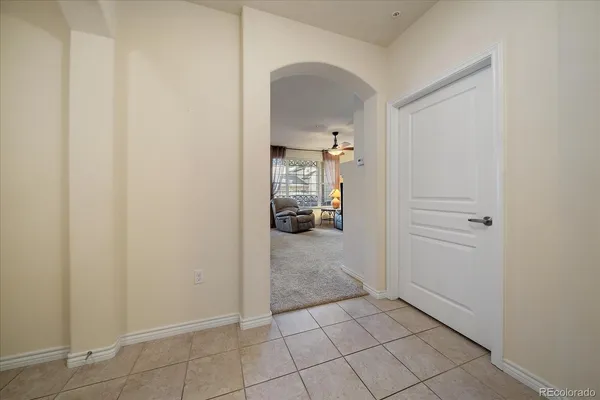 a view of a hallway view with staircase