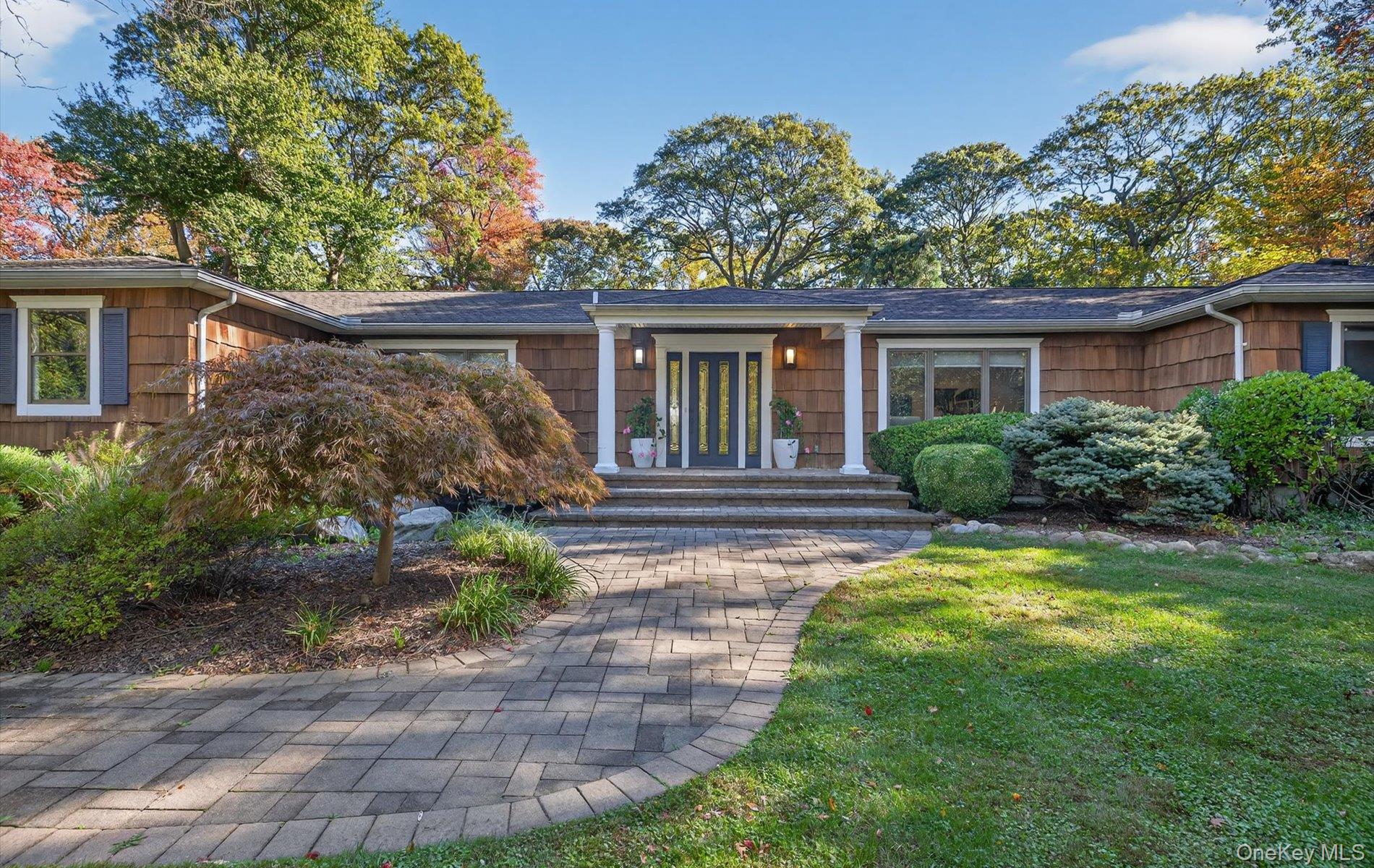 78 Bagatelle Road Melville, NY 11747 - Photo 1 of 1 a view of a house with a yard