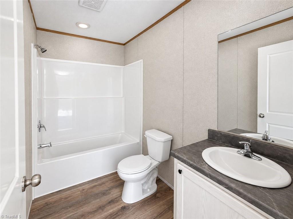 211 Paul Workman Road Lexington, NC 27292 - Photo 13 of 22 Guest Bath between Bedroom 2 and 3