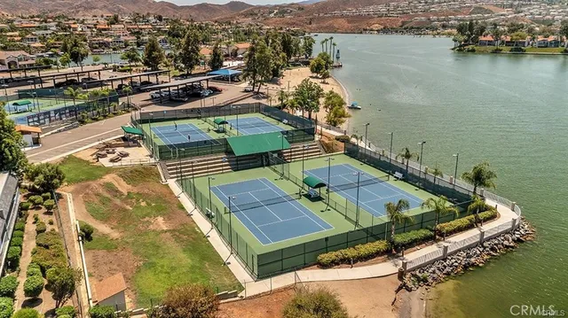 an aerial view of a house with a lake view