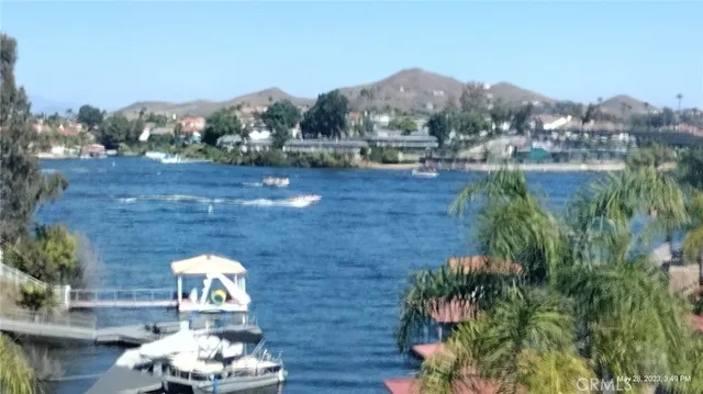 a terrace with outdoor seating and city view