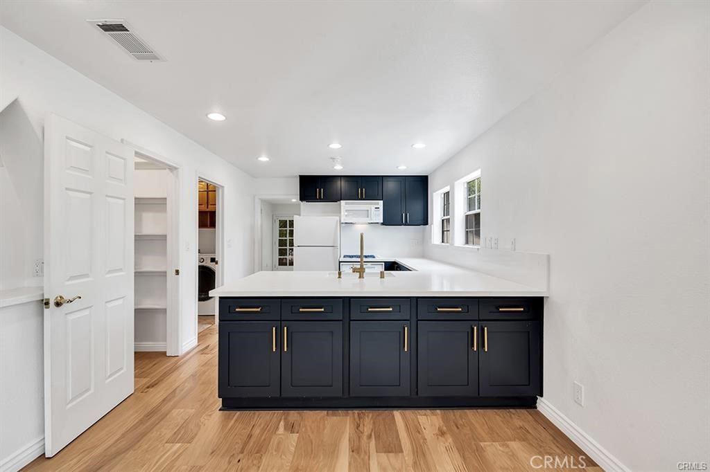 30062 Big Range Road Canyon Lake, CA 92587 - Photo 5 of 20 a kitchen with a sink and cabinets